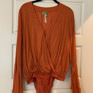 Free people long sleeve body suit size XS